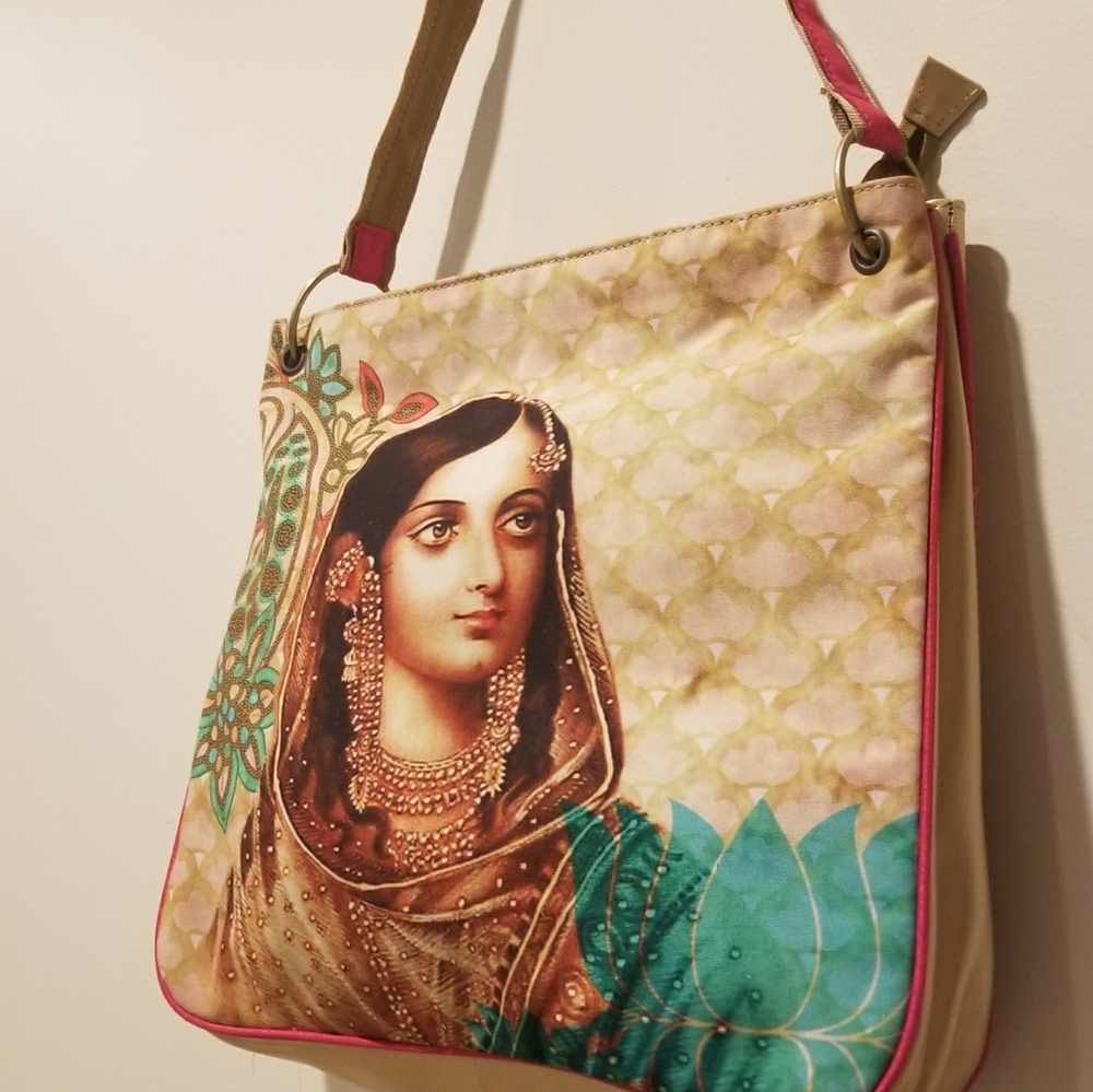 Screen printed fabric handbag in metallic gold.
